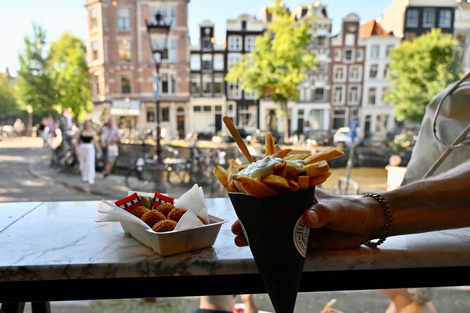 10 Tastes of Amsterdam: Food Tour by UNESCO Canals and Jordaan - A brown pub and Amsterdam’s canal ring