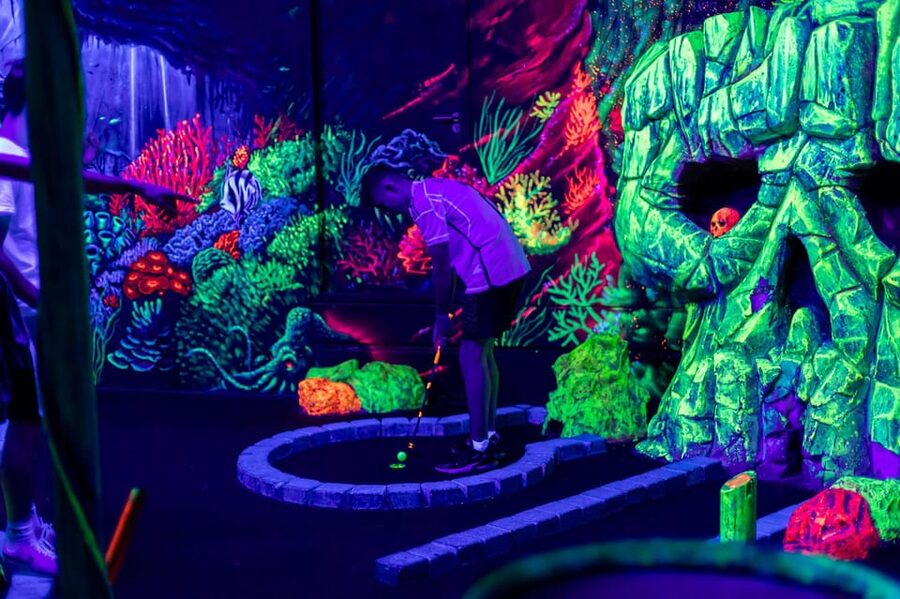 Aloha Amsterdam: 12-Hole Glow-in-the-Dark Mini-Golf - Following the pirate ships and underwater scenes