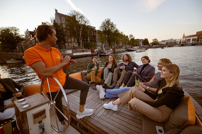 Amsterdam: 1-Hour Canal Cruise in the Evening - Evening comfort, seating, and the onboard bar