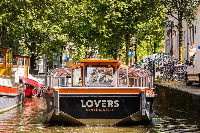 Amsterdam 1h Canal Cruise by Semi-Open Boat with Audio Guide - Museums and famous addresses along the route