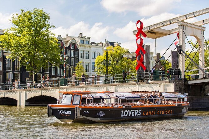 Amsterdam 1h Canal Cruise by Semi-Open Boat with Audio Guide - Merchant houses and the Golden Bend