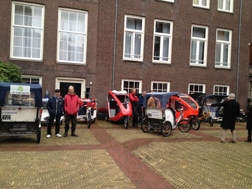 Amsterdam: 2-Hour Sightseeing Tour by Rickshaw - Side streets, photo stops, and short walks