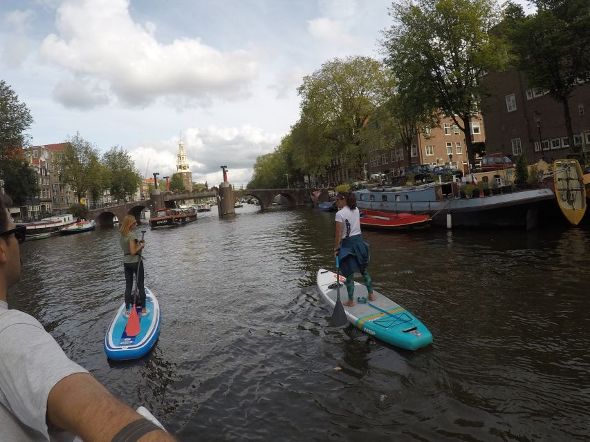 Amsterdam: 2-Hour Stand Up Paddle Board Tour - Gliding under Amsterdam’s canal bridges