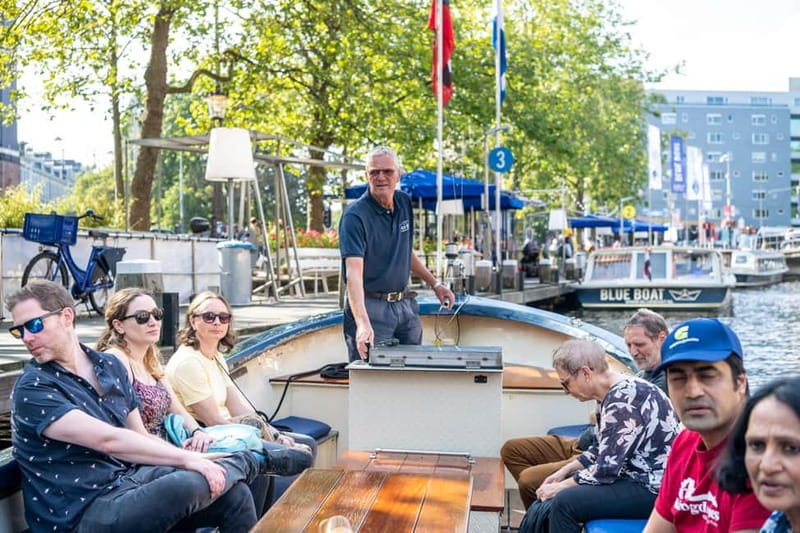 Amsterdam: 75 minute Open Boat Canal Cruise with Live Guide - Starting at Stadhouderskade near Leidseplein