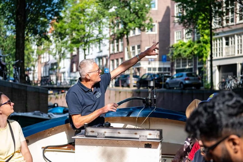 Amsterdam: 75 minute Open Boat Canal Cruise with Live Guide - Westerkerk and Prinsengracht from the water