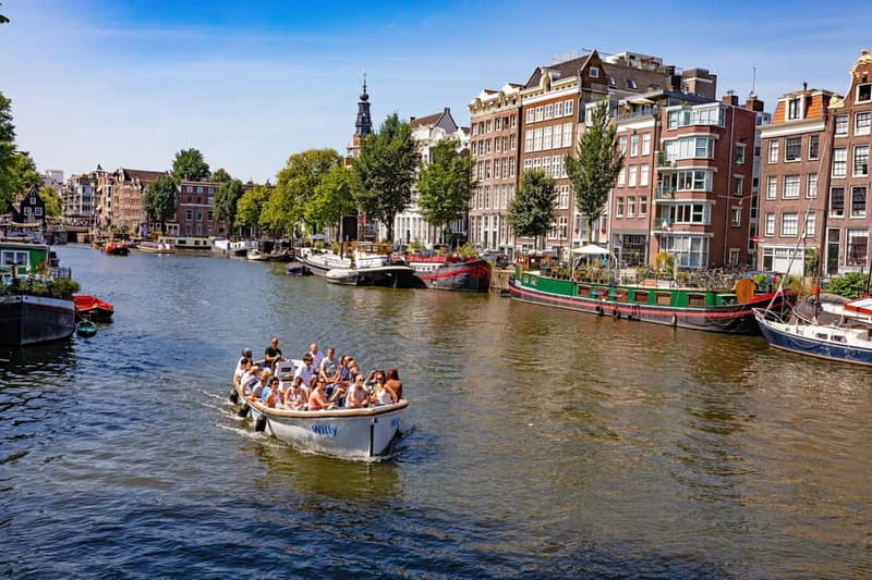 Amsterdam: 75 minute Open Boat Canal Cruise with Live Guide - Museum Quarter and the final return