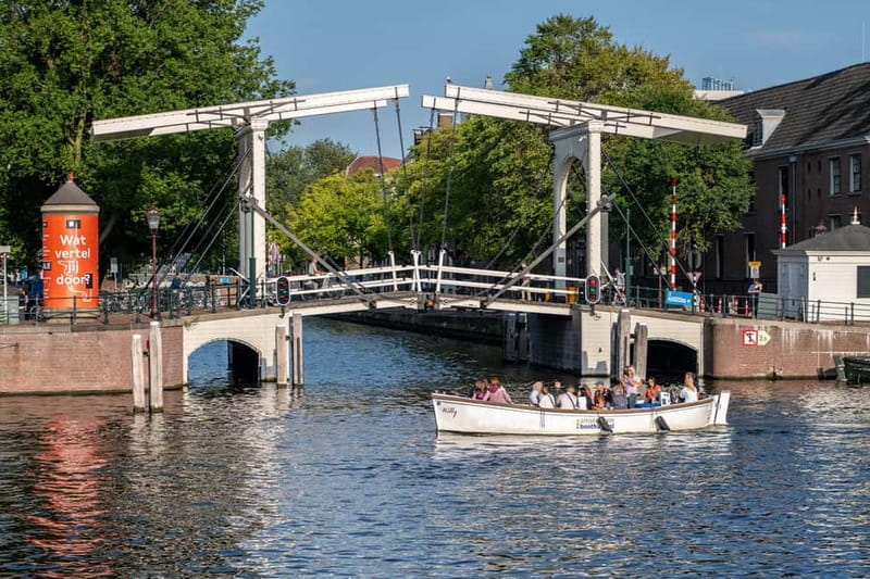 Amsterdam: 75 minute Open Boat Canal Cruise with Live Guide - What the 75 minutes feel like