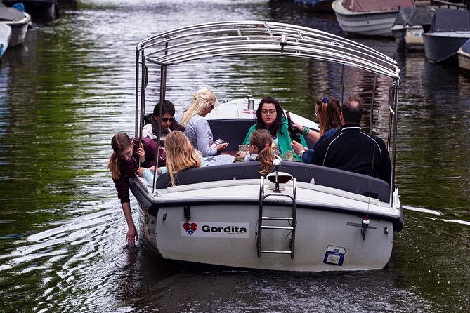 Amsterdam 90-min Private Canal Cruise with Live Guide and Drinks - Out onto the Amstel