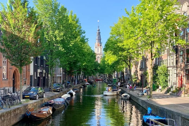 Amsterdam: Anne Frank Walking Tour - Guided in EN/DE/IT/ES - Nieuwmarkt and Zuiderkerk: setting the neighborhood
