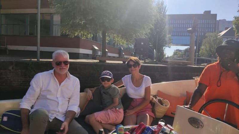 Amsterdam bike tour with a French-speaking guide local! - Dam Square and the central city