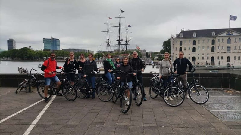 Amsterdam bike tour with a French-speaking guide local! - Westerkerk, the Nine Streets, and canal architecture