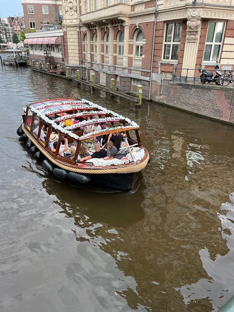 Amsterdam: Boat Tour with Optional Unlimited Drinks - Sint Antoniesluis, the Amstel, and the Dancing Houses