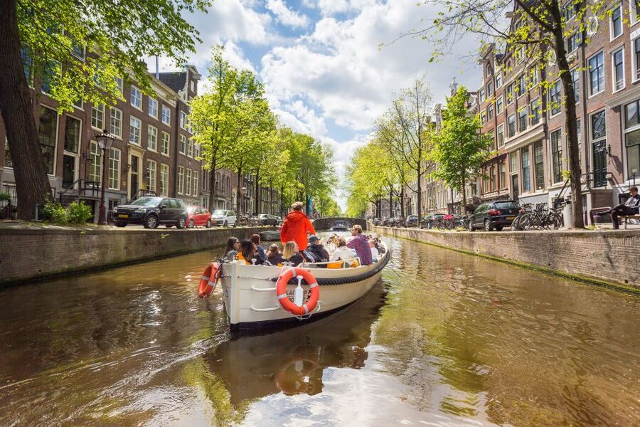 Amsterdam: Canal Belt Private Beer Boat Tour - Weather and comfort on an open-top boat