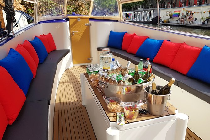 Amsterdam: Canal Booze Cruise with Unlimited Drinks Option - Passing Through De Wallen