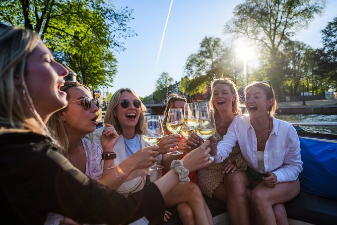 Amsterdam: Canal Booze Cruise with Unlimited Drinks Option - Rain, Seating, and Comfort