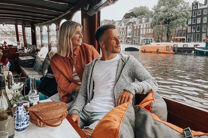 Amsterdam Canal Cruise in Classic Salon Boat With Drinks and Cheese - The guide commentary and what you may learn
