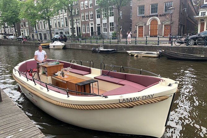 Amsterdam canal cruise in open boat – Guided tour - Central Station and Amsterdam’s changing waterfront