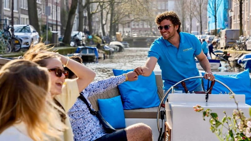Amsterdam: Canal Cruise in Open Boat with Drink Option - From Royal Theater Carré to Magere Brug