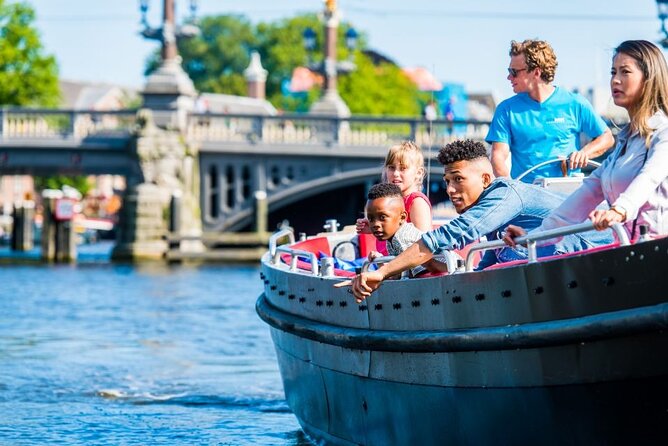 Amsterdam Canal Cruise in Open Boat with Unlimited Drinks Option - Sunset and evening departures change the mood