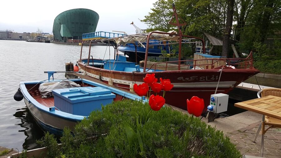 Amsterdam: Canal Cruise on a Wooden Refugee Boat - A Social Enterprise With a Practical Purpose