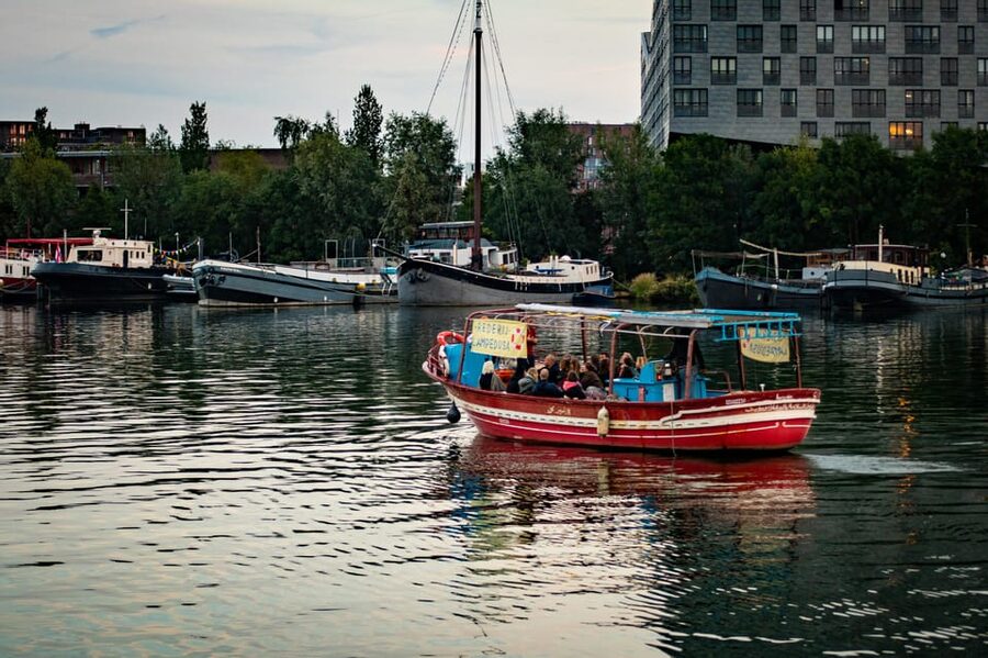 Amsterdam: Canal Cruise on a Wooden Refugee Boat - Weather, Seating, and What to Bring