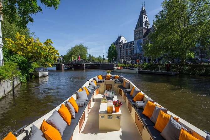 Amsterdam Canal Cruise with German Guide and unlimited drinks - The Love Bridge and Amsterdam’s famous sights