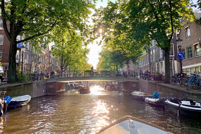 Amsterdam Canal Cruise with German Guide and unlimited drinks - The Hermitage area and the Mint Tower