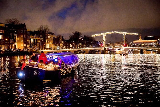 Amsterdam Canal Cruise With Live Guide and Unlimited Drinks - The Amstel, opera house, and old city center