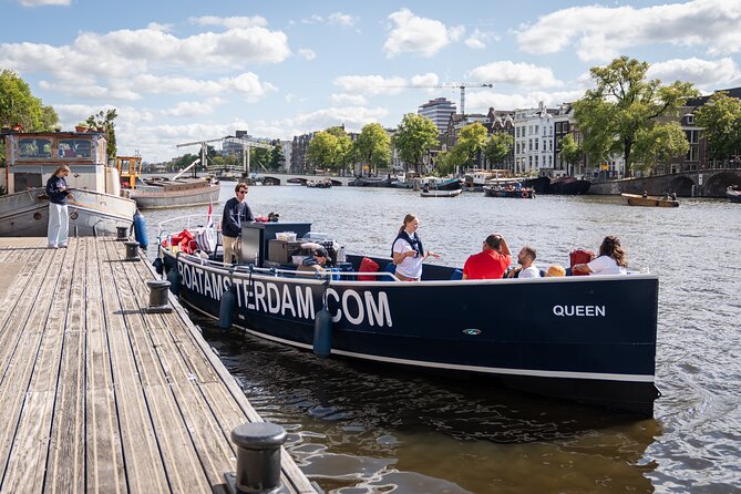 Amsterdam Canal Cruise with Live guide & Two drinks - Central St. - The meeting point at Stationsplein 24