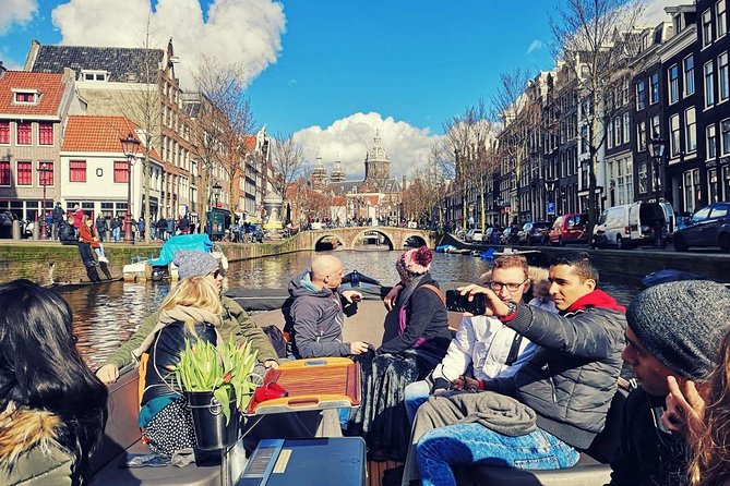 Amsterdam Canal Tour by Open Boat – 90 min Small Group Experience - Medieval defenses and the ship Amsterdam
