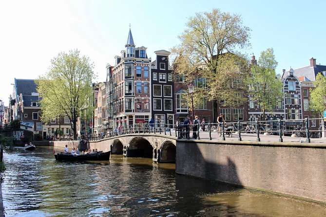 Amsterdam Canal Tour by Open Boat – 90 min Small Group Experience - The Seven Bridges Canal and the Prinsengracht