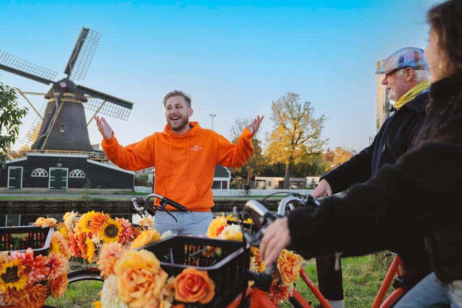 Amsterdam: Cheese, Windmill & Countryside Bike Tour - Riding the Nieuwendammerdijk beside the IJ River