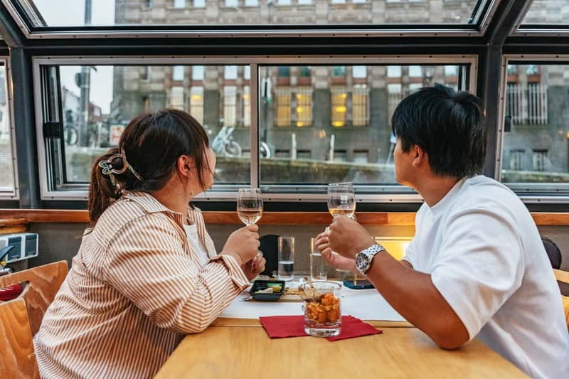 Amsterdam: Cheese & Wine Cruise Tasting Experience - The Magere Brug and Amsterdam after dark