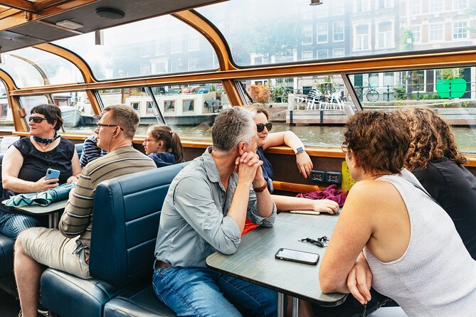 Amsterdam City Centre Cruise on heated boat with Audioguide - Boarding near Centraal Station or Damrak