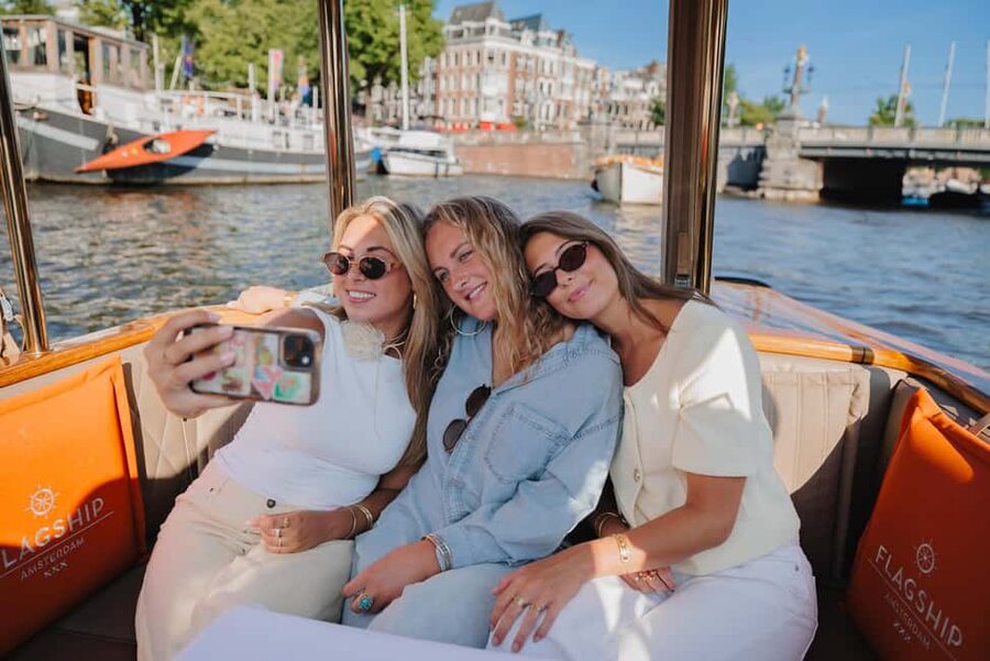 Amsterdam: Classic Boat Cruise with Optional Cheese & Wine - How the covered boat affects the experience
