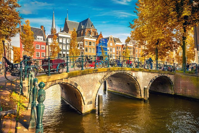 Gabled houses along an Amsterdam canal in autumn