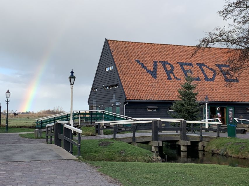 Amsterdam: Countryside Bike Tour and Zaanse Schans Windmills - Sawmills, paper making, and Dutch ingenuity