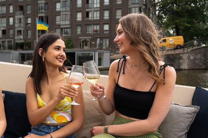 Amsterdam: Evening Candle Light Cruise With Wine & Cheese - Waterlooplein, Stopera, and the Amstel