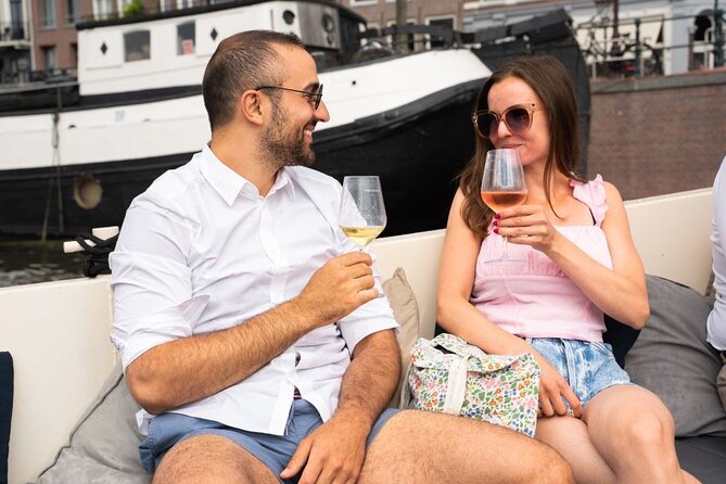 Amsterdam: Evening Candle Light Cruise With Wine & Cheese - Seven Bridges and the best photo opportunities
