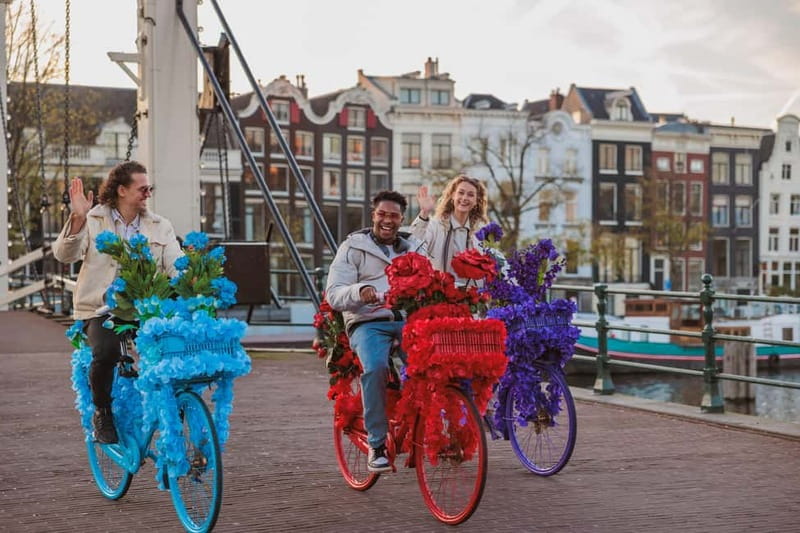 Amsterdam: Explore Canals, Guided Tour on Flower Bikes - Why a flower-covered bicycle changes the ride