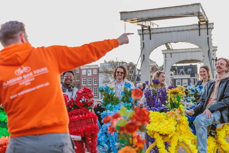 Amsterdam: Explore Canals, Guided Tour on Flower Bikes - Dam Square and the return route