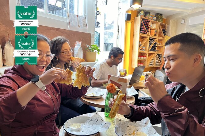Amsterdam Food and Cultural Tour with Tastings - Monarchy stories and Amsterdam’s crooked houses