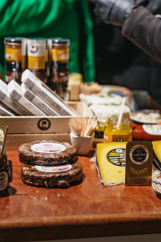 Amsterdam: Food and Culture Walking Tour with Tastings - Dutch cheese and herring: simple foods with strong opinions