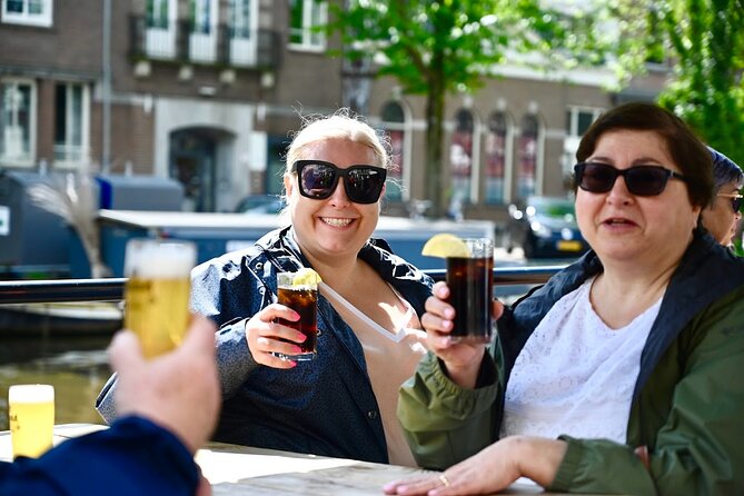 Amsterdam Food Tour of 10+ Local Classic Tastings in Jordaan Area - Landmarks add weight between the tastings