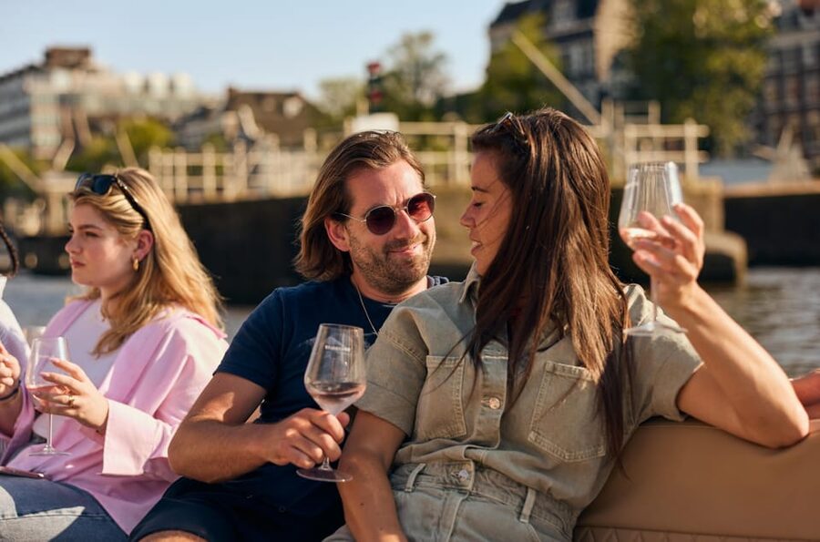 Amsterdam: German Guided Canal Cruise with on Board Bar - Basilica of Saint Nicholas and the maritime story