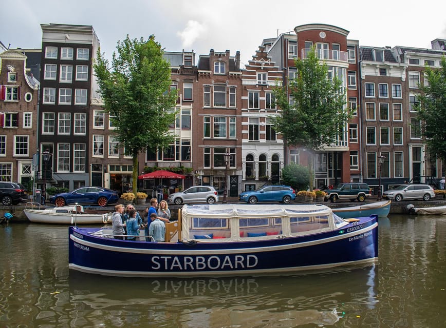 Amsterdam: German Guided Canal Cruise with on Board Bar - Prinsengracht and the final turn at Magere Brug