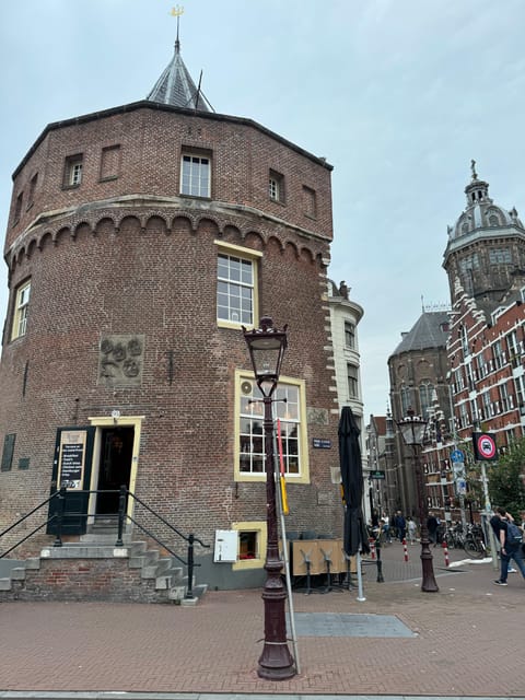 Amsterdam: Ghost Walking Tour and Dark History - Dam Square, where public history turns grim