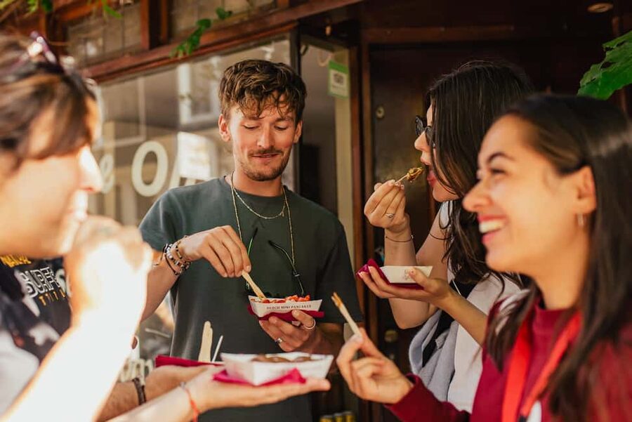 Amsterdam: Guided Cultural Food Tour in German or English - Magna Plaza and the canal belt