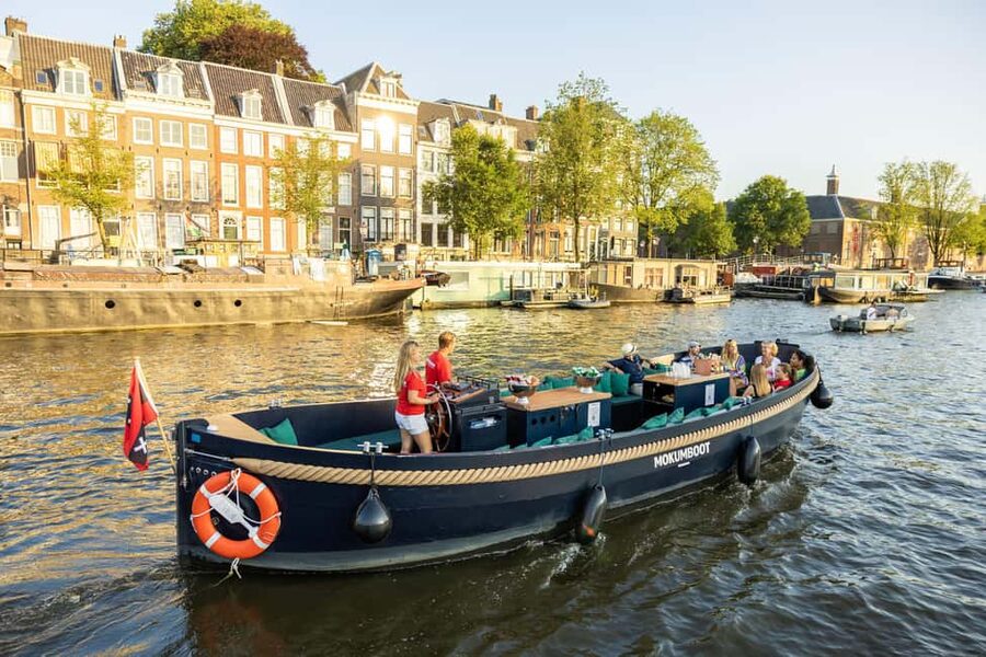 Amsterdam: Guided Open Boat Canal Cruise Including Drink - Starting beside Amsterdam Centraal