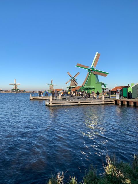 Amsterdam: Guided Zaanse Schans, Windmills & Cheese Tour - Windmills, merchant houses, and free time